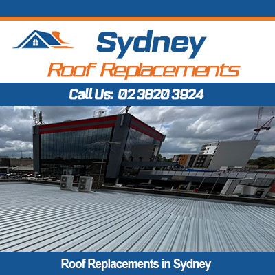Roof replacement in Sydney for commercial building with corrugated metal roofing installation